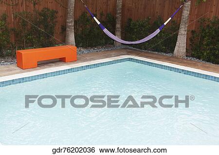 Swimming pool in a tourist resort View Large Photo Image Stock Photograph - Swimming pool in a tourist resort. Fotosearch
