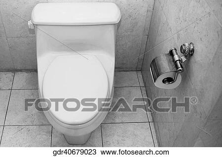 Stock Image - Toilet bowl in a toilet. Fotosearch