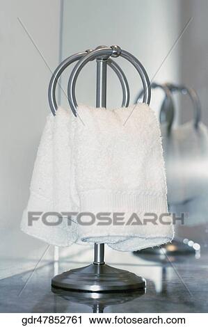 Towels on rings in the bathroom View Large Photo Image Stock Image - Towels on rings in the bathroom. Fotosearch