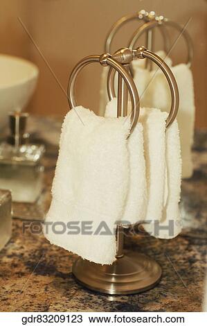 Towels on rings in the bathroom View Large Photo Image Stock Image - Towels on rings in the bathroom. Fotosearch