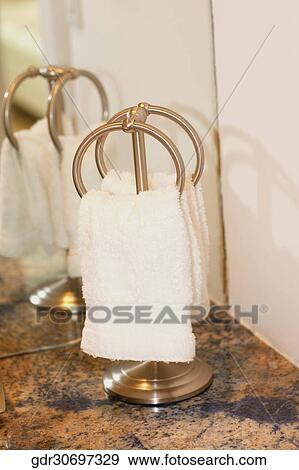 Towels on rings in the bathroom View Large Photo Image Stock Photo - Towels on rings in the bathroom. Fotosearch