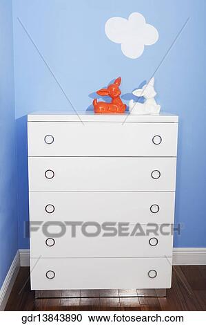 Two toys on a sideboard View Large Photo Image Stock Image - Two toys on a sideboard. Fotosearch