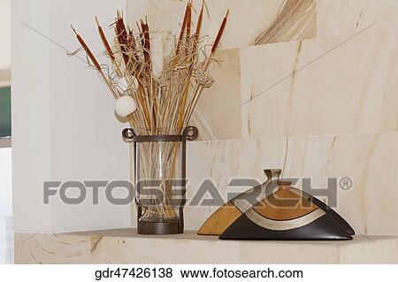 Vase with dry reed sticks View Large Photo Image Stock Photo - Vase with dry reed sticks. Fotosearch
