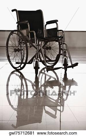 Stock Image - Wheelchair in a hospital. Fotosearch