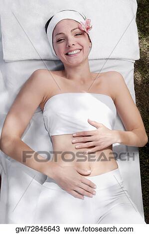 Woman receiving facial treatment View Large Photo Image Stock Image - Woman receiving facial treatment. Fotosearch