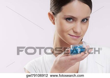 Woman smelling aroma gel View Large Photo Image Stock Image - Woman smelling aroma gel. Fotosearch