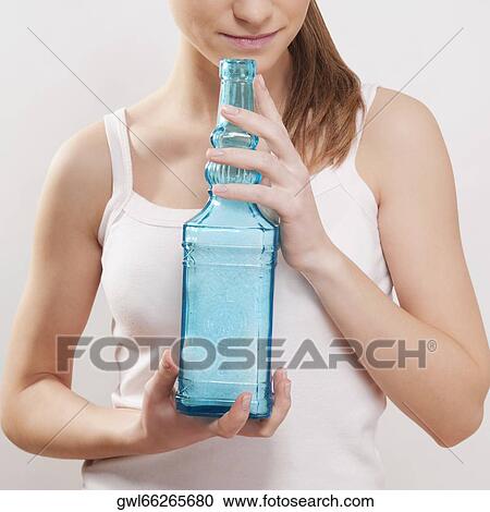 Woman smelling bath crystals View Large Photo Image Stock Image - Woman smelling bath crystals. Fotosearch