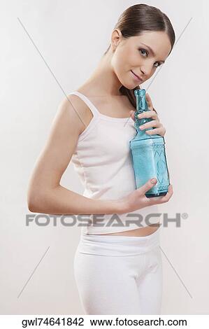 Woman smelling bath crystals View Large Photo Image Stock Image - Woman smelling bath crystals. Fotosearch