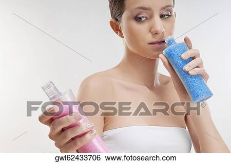 Woman smelling bath crystals View Large Photo Image Stock Photograph - Woman smelling bath crystals. Fotosearch