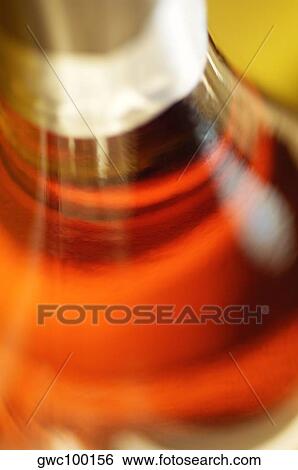Close-up of a champagne bottle View Large Photo Image Stock Photograph - Close-up of a champagne bottle. Fotosearch