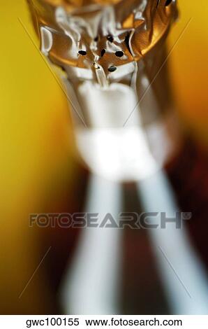 Close-up of a champagne bottle View Large Photo Image Stock Photography - Close-up of a champagne bottle. Fotosearch