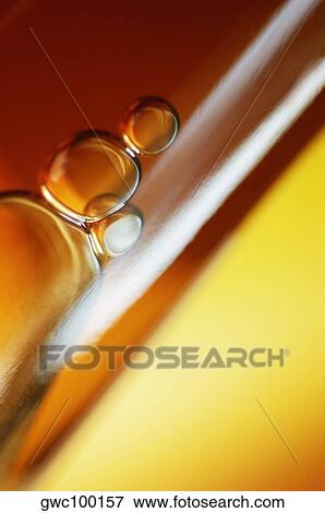 Close-up of bubbles in a wine bottle View Large Photo Image Stock Photo - Close-up of bubbles in a wine bottle. Fotosearch
