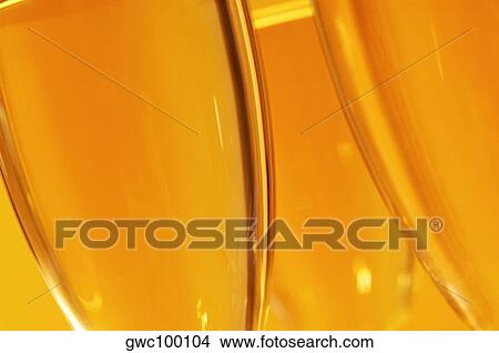 Close-up of champagne in three champagne flutes View Large Photo Image Picture - Close-up of champagne in three champagne flutes. Fotosearch