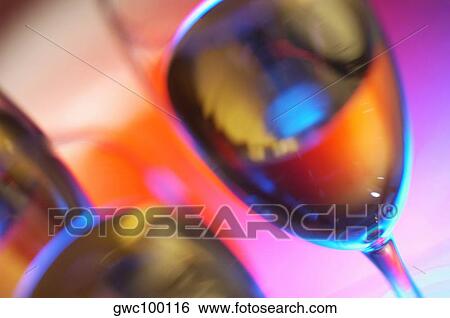 Close-up of champagne in three champagne flutes View Large Photo Image Stock Photograph - Close-up of champagne in three champagne flutes. Fotosearch