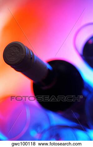 High angle view of a wine bottle with three wineglasses View Large Photo Image Stock Photo - High angle view of a wine bottle with three wineglasses. Fotosearch
