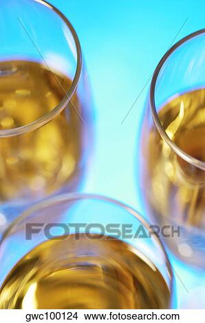 High angle view of champagne in three champagne flutes View Large Photo Image Picture - High angle view of champagne in three champagne flutes. Fotosearch