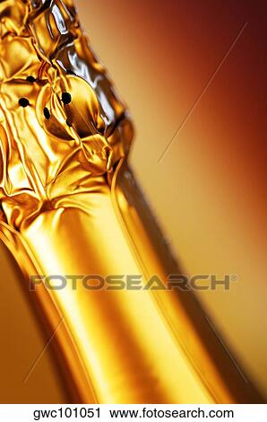 Close-up of a champagne bottle View Large Photo Image Stock Image - Close-up of a champagne bottle. Fotosearch