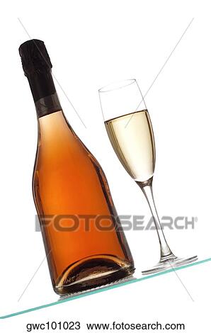 Close-up of a glass of wine with a wine bottle View Large Photo Image Stock Image - Close-up of a glass of wine with a wine bottle. Fotosearch