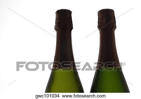 Close-up of two champagne bottles View Large Photo Image Picture - Close-up of two champagne bottles. Fotosearch