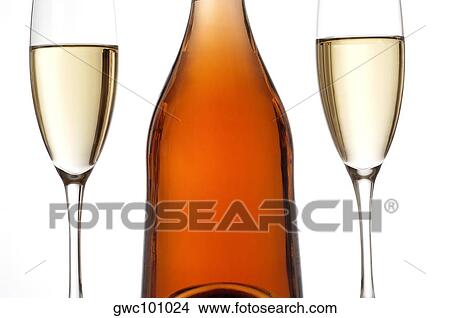 Picture - Close-up of two glasses of wine with a wine bottle. Fotosearch