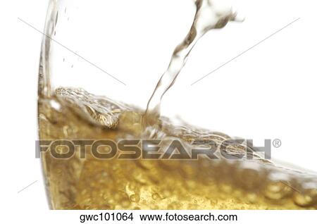 Close-up of wine being poured into a wineglass View Large Photo Image Picture - Close-up of wine being poured into a wineglass. Fotosearch