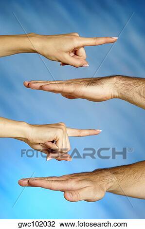Stock Image - Close-up of a man and a woman's hands. Fotosearch