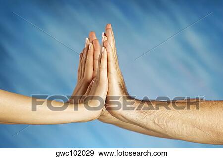 Close-up of a man and a woman's hands together View Large Photo Image Stock Photo - Close-up of a man and a woman's hands together. Fotosearch