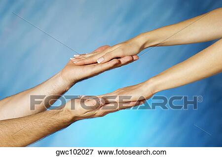 Stock Photo - Close-up of a woman's hands on a man's hands. Fotosearch