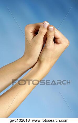 Stock Image - Close-up of a woman's hands. Fotosearch