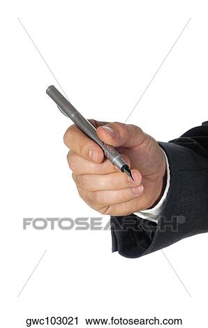 Stock Image - Close-up of a businessman holding a pen. Fotosearch