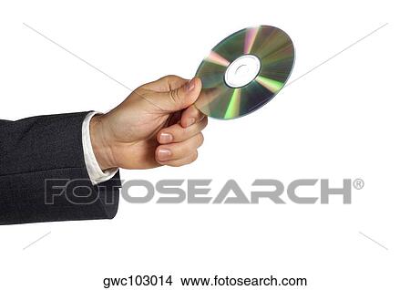 Picture - Close-up of a businessman holding a compact disk. Fotosearch