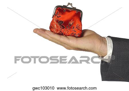 Stock Image - Close-up of a businessman holding a change purse. Fotosearch