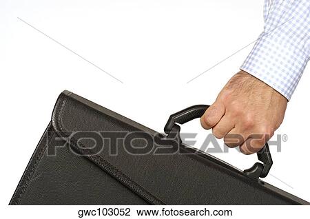 Close-up of a businessman holding a briefcase View Large Photo Image Stock Image - Close-up of a businessman holding a briefcase. Fotosearch