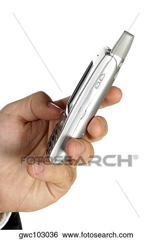 Stock Photograph - Close-up of a businessman holding a personal data assistant. Fotosearch