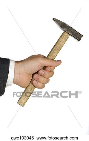 Close-up of a businessman holding a hammer View Large Photo Image Stock Photography - Close-up of a businessman holding a hammer. Fotosearch