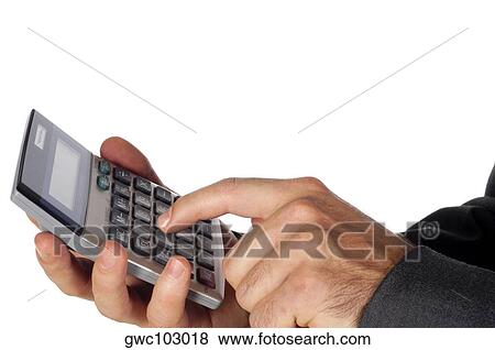 Close-up of a businessman using a calculator View Large Photo Image Stock Photo - Close-up of a businessman using a calculator. Fotosearch