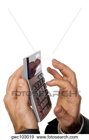 Close-up of a businessman using a calculator View Large Photo Image Stock Photo - Close-up of a businessman using a calculator. Fotosearch