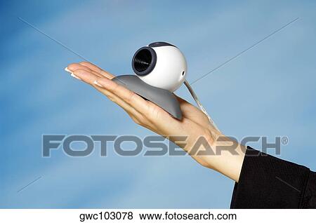 Close-up of a video conference camera on a woman's hand View Large Photo Image Stock Photo - Close-up of a video conference camera on a woman's hand. Fotosearch