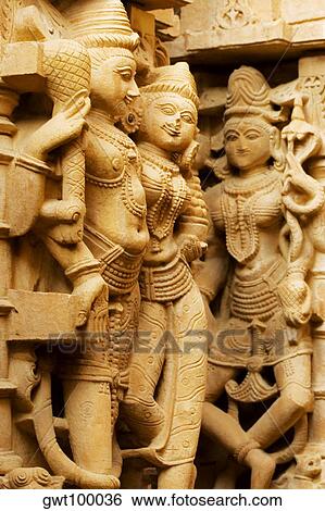 Carved stone statues in a temple, Jaisalmer, Rajasthan, India View Large Photo Image Stock Photograph - Carved stone statues in a temple, Jaisalmer, Rajasthan, India. Fotosearch