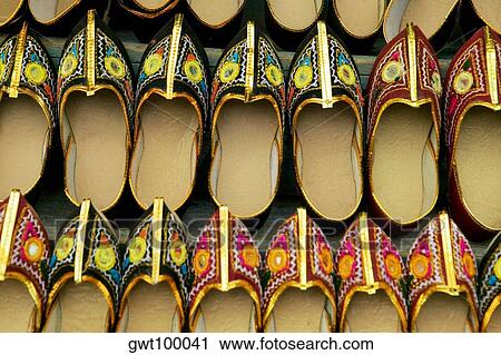 Close-up of shoes hanging at a store in a market, Pushkar, Rajasthan, India View Large Photo Image Stock Image - Close-up of shoes hanging at a store in a market, Pushkar, Rajasthan, India. Fotosearch