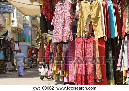 Clothes on display in a market, Pushkar, Rajasthan, India View Large Photo Image Stock Image - Clothes on display in a market, Pushkar, Rajasthan, India. Fotosearch