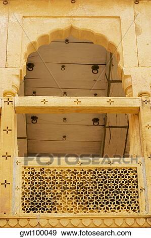 Low angle view of a balcony in the Rajmahal, Jaisalmer, Rajasthan, India View Large Photo Image Stock Photo - Low angle view of a balcony in the Rajmahal, Jaisalmer, Rajasthan, India. Fotosearch