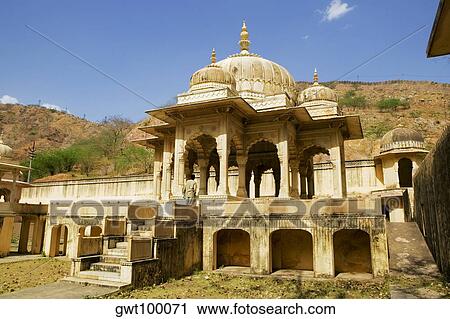 Low angle view of a person standing at the entrance of a building, Royal Gaitor, Jaipur, Rajasthan, India View Large Photo Image Stock Image - Low angle view of a person standing at the entrance of a building, Royal Gaitor, Jaipur, Rajasthan, India. Fotosearch