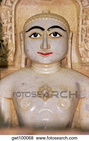 Marble statue of a religious figure in a temple, Jaisalmer, Rajasthan, India View Large Photo Image Stock Photo - Marble statue of a religious figure in a temple, Jaisalmer, Rajasthan, India. Fotosearch