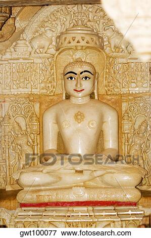 Statue of a religious figure in a temple, Jaisalmer, Rajasthan, India View Large Photo Image Stock Photo - Statue of a religious figure in a temple, Jaisalmer, Rajasthan, India. Fotosearch