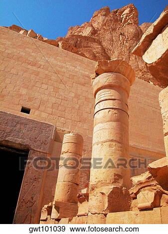 Low angle view of a stone wall and column, Egypt View Large Photo Image Stock Photo - Low angle view of a stone wall and column, Egypt. Fotosearch