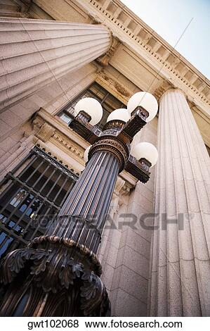 Stock Photo - Close-up of a lamp on the Treasury Building, Washington DC, USA. Fotosearch