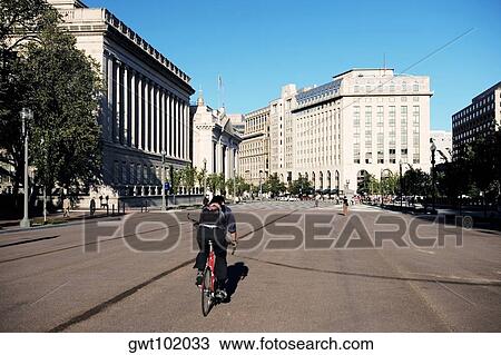 Person cycling on the street, Washington DC, USA View Large Photo Image Stock Image - Person cycling on the street, Washington DC, USA. Fotosearch