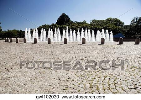 Water fountains in front of trees, Washington DC, USA View Large Photo Image Stock Image - Water fountains in front of trees, Washington DC, USA. Fotosearch