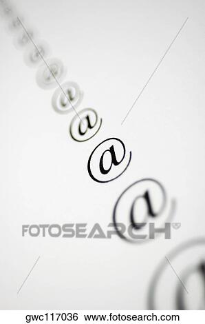 Stock Photograph - Close-up of 'at' symbols. Fotosearch